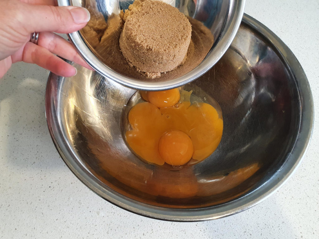 Adding brown sugar to egg yokes