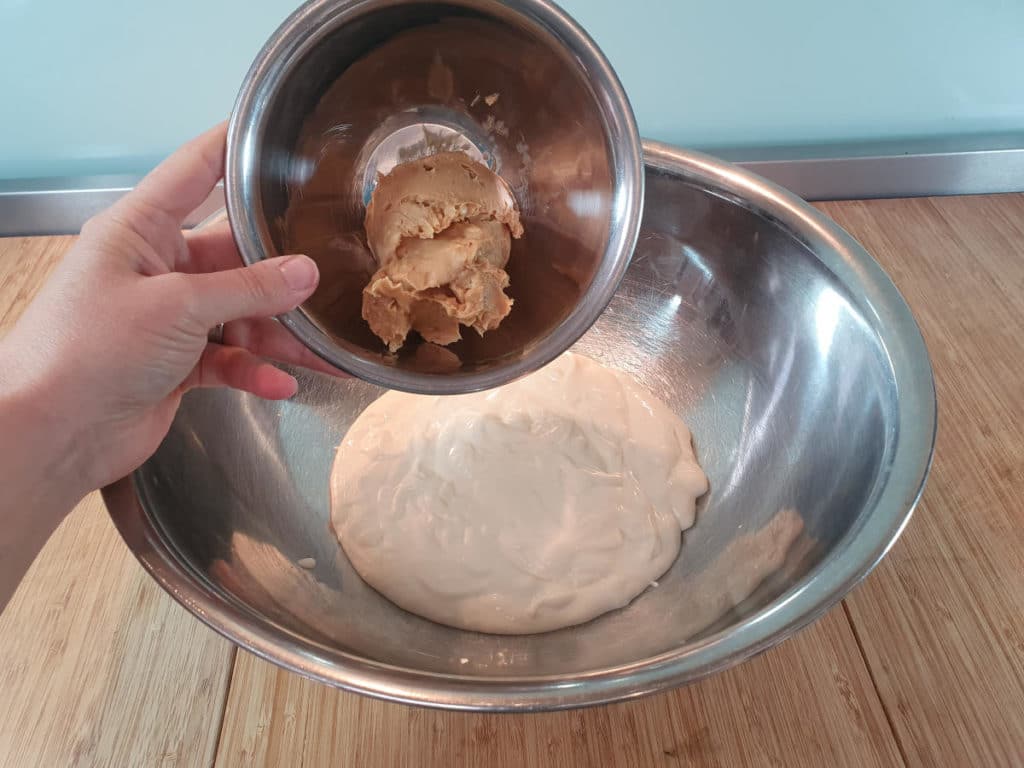 Adding peanut butter to bowl