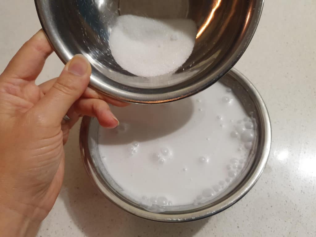 Adding sugar to coconut milk