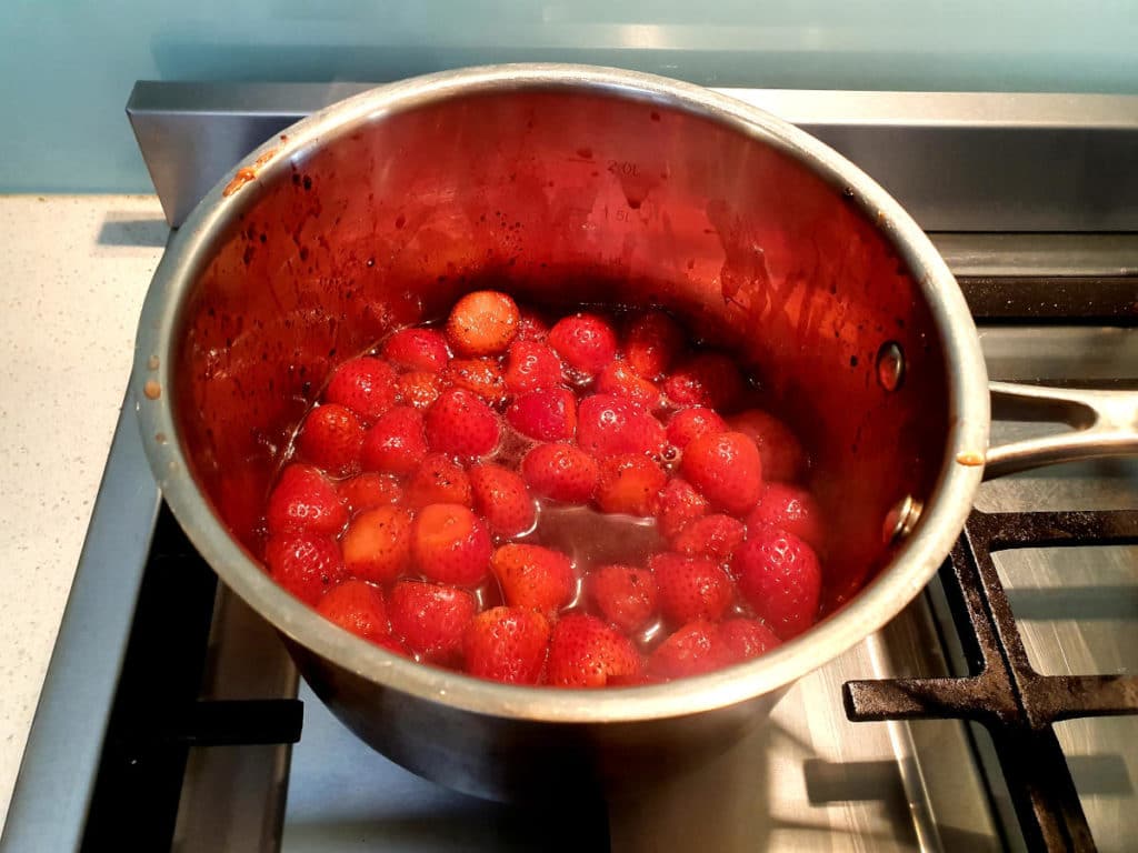Strawberry, balsamic and black pepper popsicles 8 Cooking popsicle mix in pot