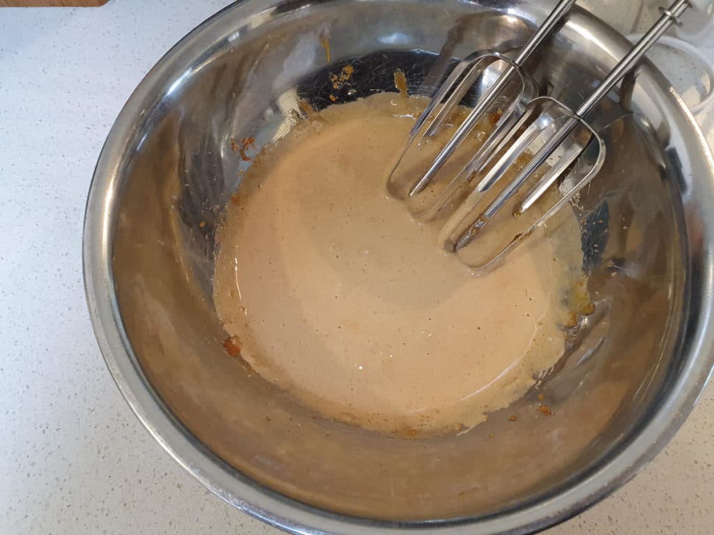 Hot cross bun ice cream 8 Mixing brown sugar and egg yokes finished