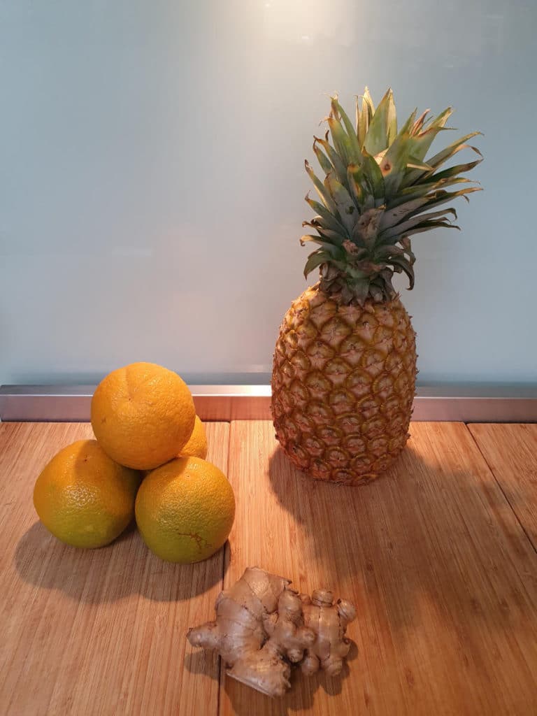 Popsicle ingredients, pineapple, orange and ginger