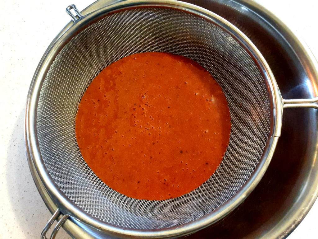 Strawberry, balsamic and black pepper popsicles 9 Straining popsicle mix