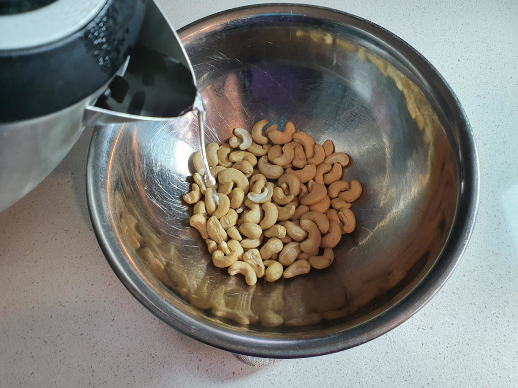 Adding boiling water to raw cashews