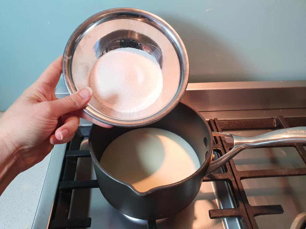 Sour Cream Ice Cream 5 Adding sugar to pot