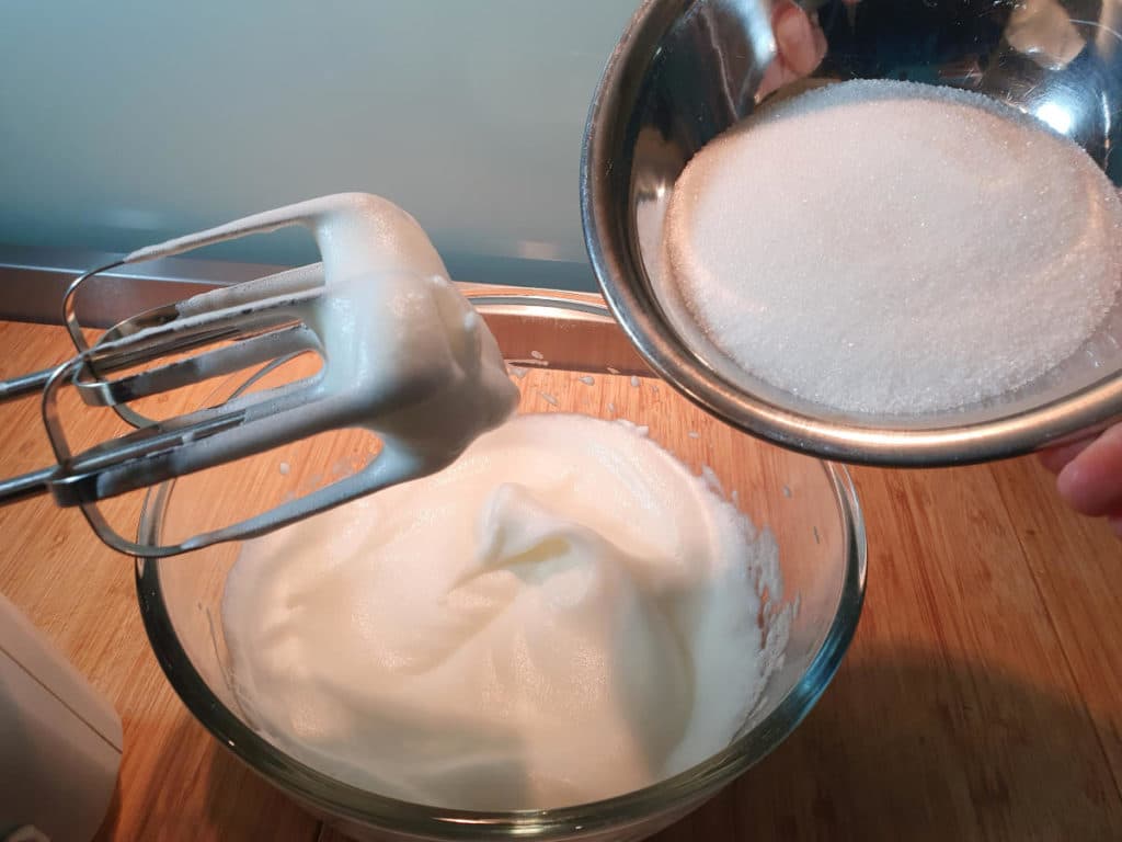 Adding sugar to whipped egg whites