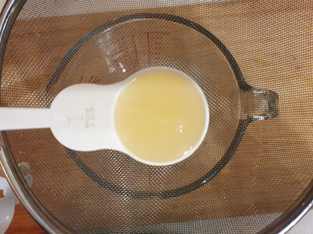 Straining and adding lemon juice