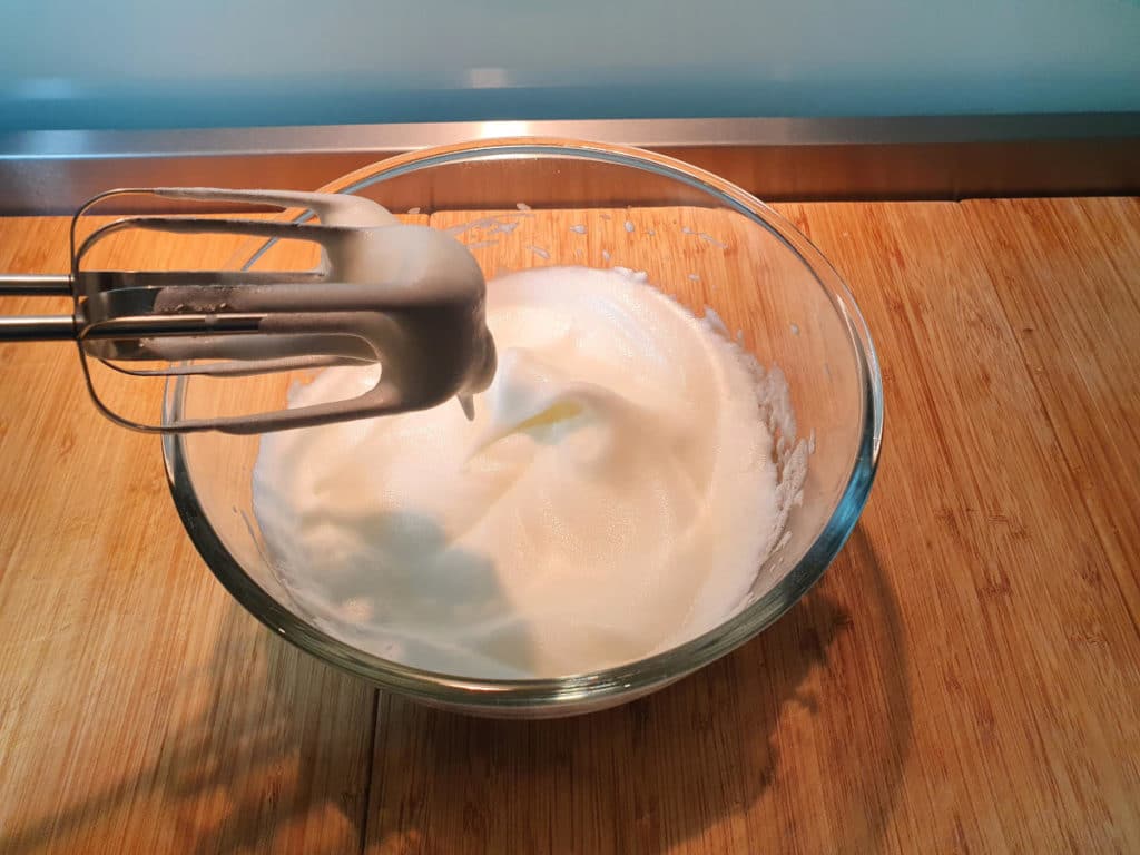 Whipped egg whites with soft peaks