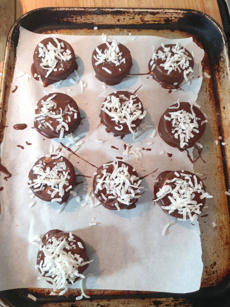 dipped bites with coconut on top