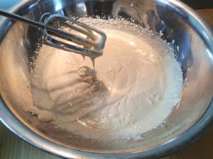 mixing peanut butter ice cream base