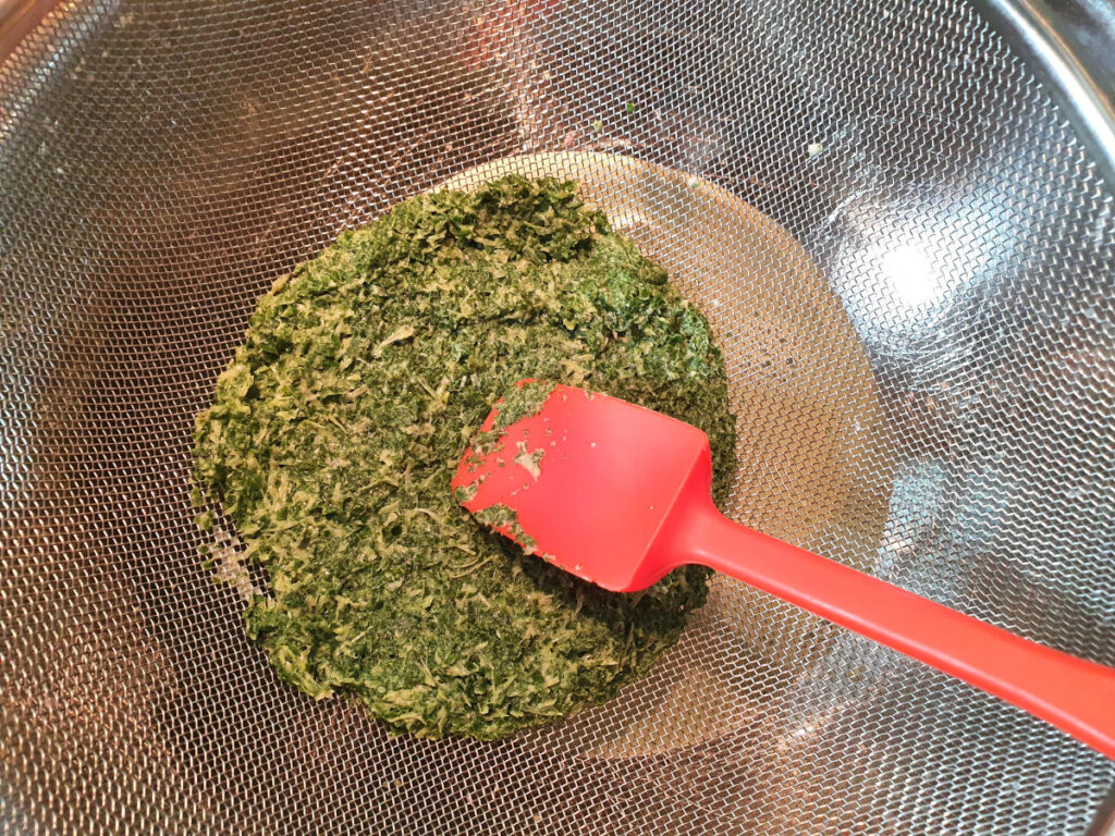 Mint choc chip ice cream 19 pressing on mint to squeeze out infused milk