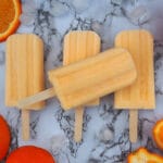 Easy tangelo creamsicles in a row with one on top