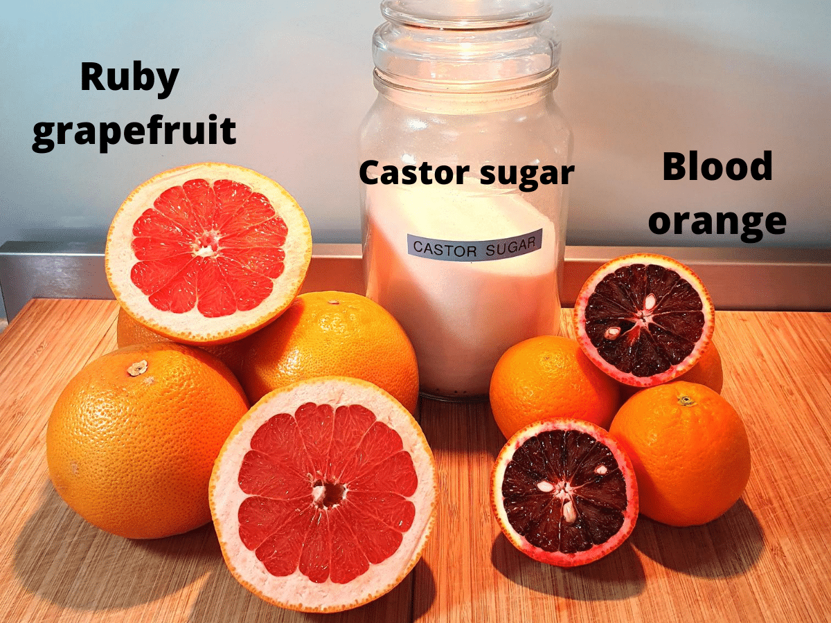 ingredients for popsicles, ruby grapefruit, castor sugar and blood oranges