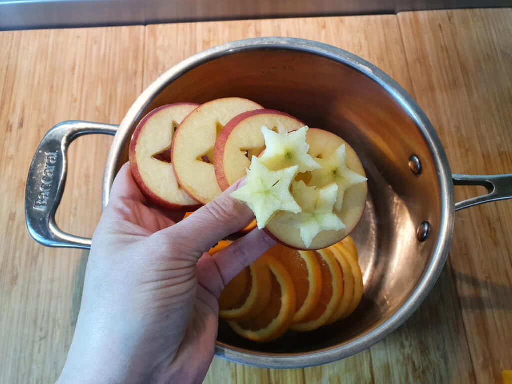 adding apple slices and start to pot.