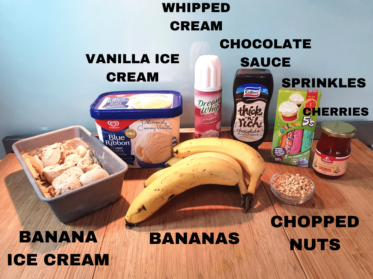 banana split ingredients, banana ice cream, vanilla ice cream, bananas, whipped cream, chocolate sauce, sprinkles, chopped nuts, cherries.