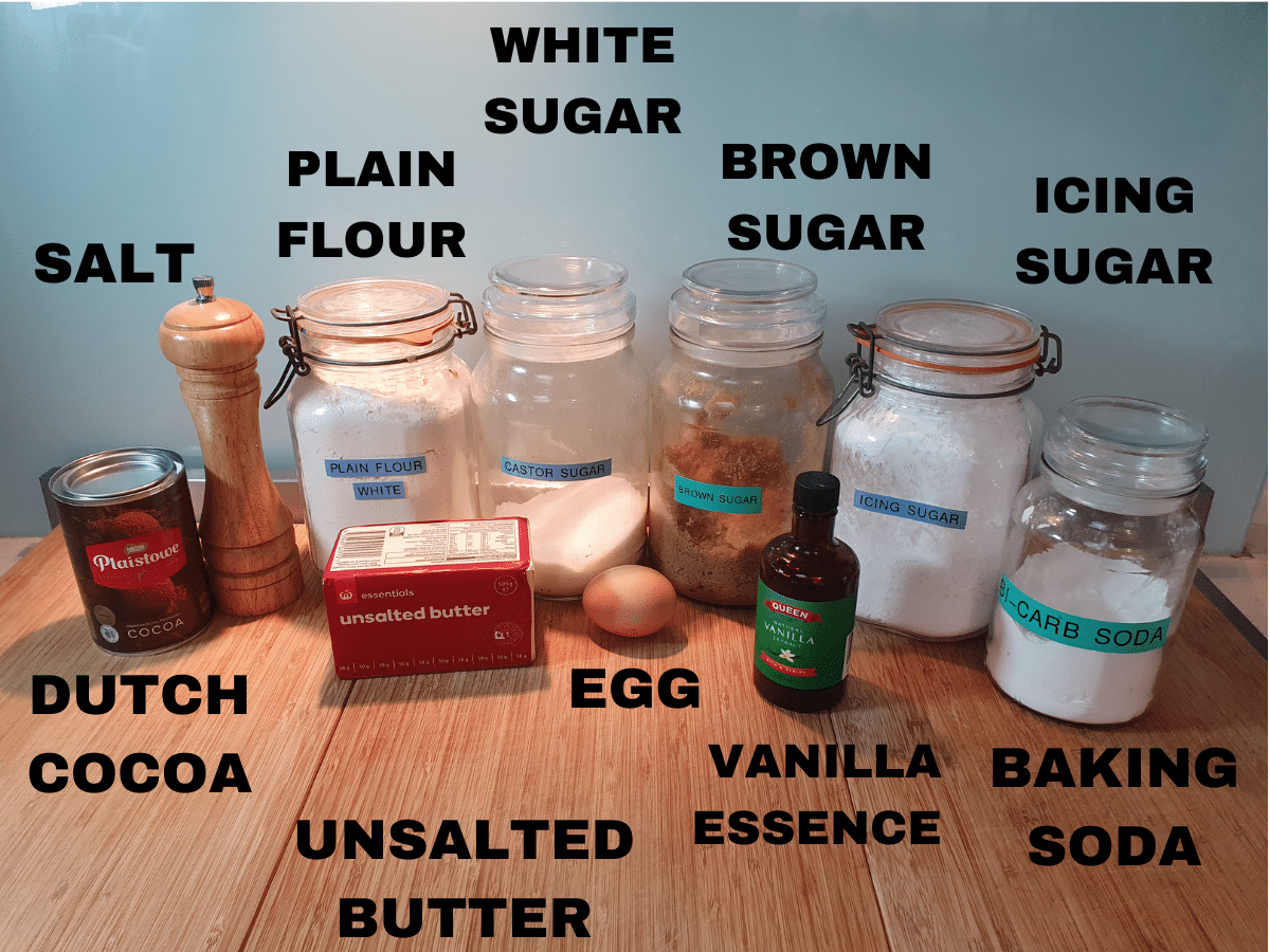homemade oreos ingredients, dutch cocoa powder, salt, plain flour, white sugar, brown sugar, icing sugar, baking soda, vanilla essence, egg and unsalted butter.