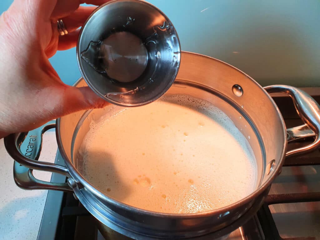 adding glucose syrup to double boiler