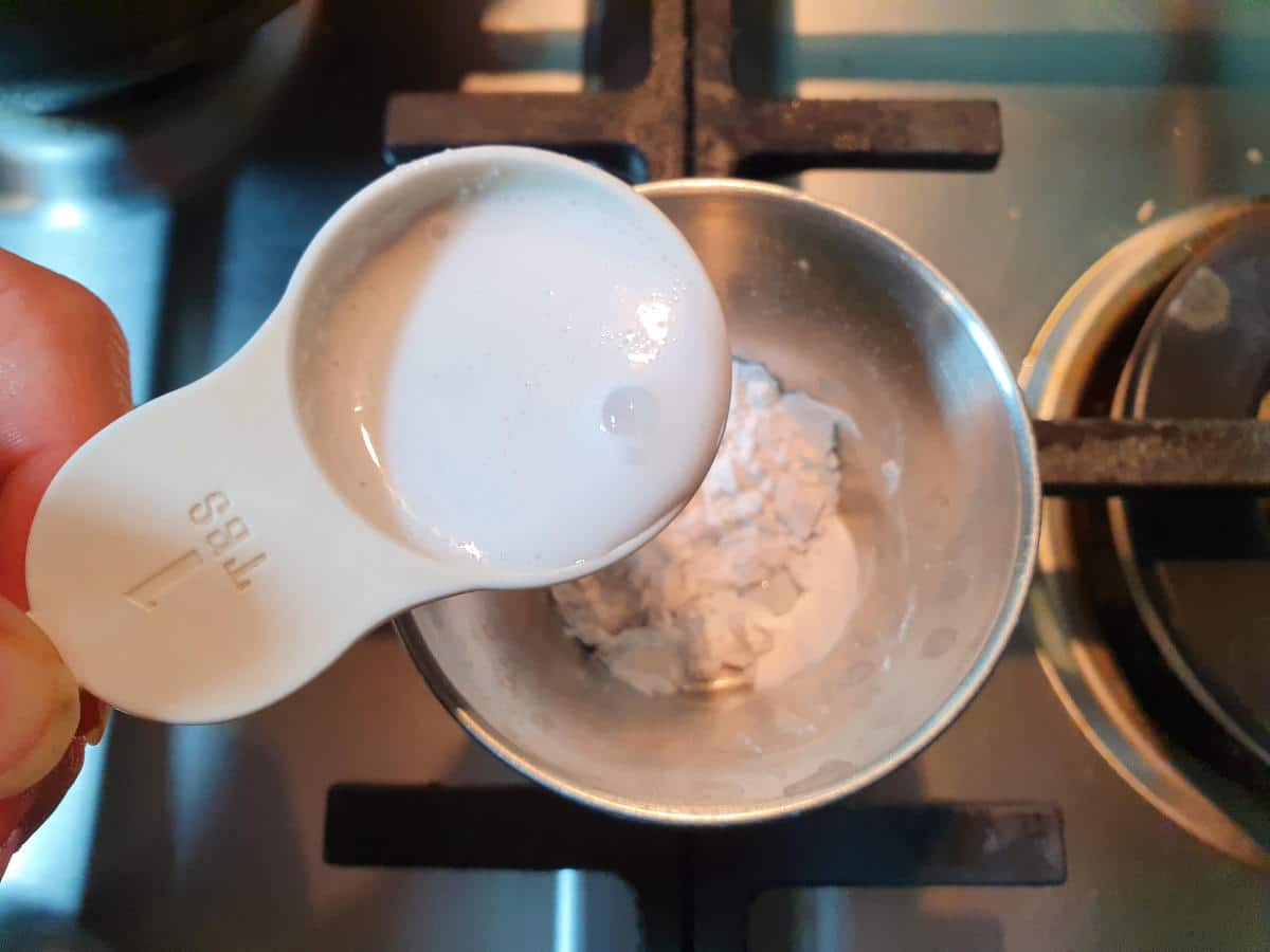 adding milk to tapioca starch.