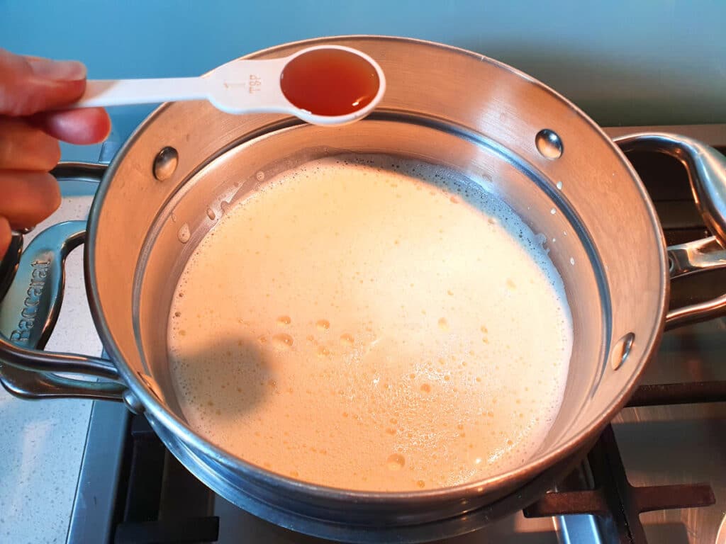 adding vanilla to mix in double boiler.