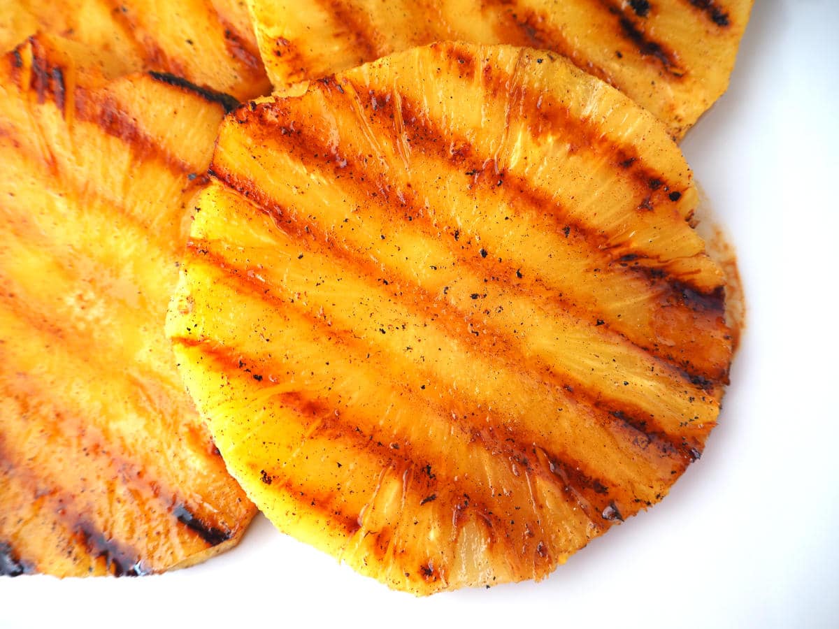 Top down view of grilled pineapple showing griddle lines.