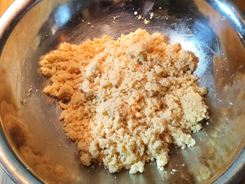 wet bread crumb looking cookie mix after mixing.