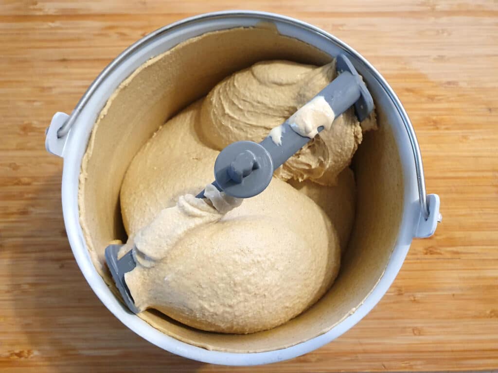 top down view of churned ice cream in ice cream churning bowl.