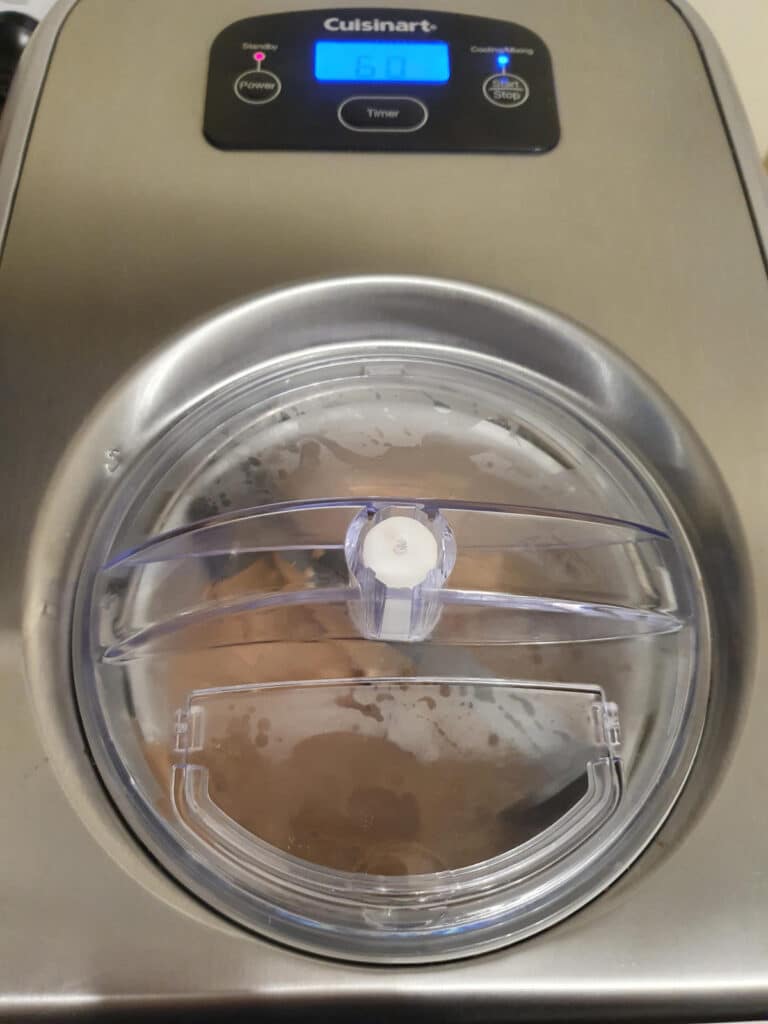 Milo ice cream 12 churning ice cream in ice cream churner.