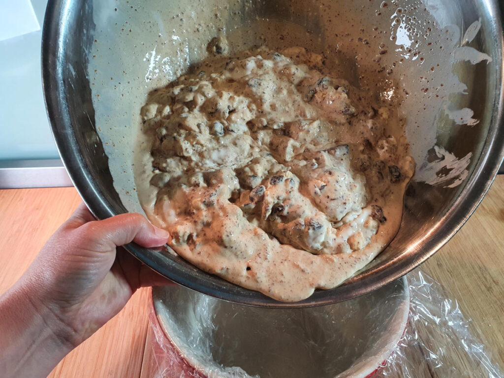 Tipping pudding mix into pudding bowl.