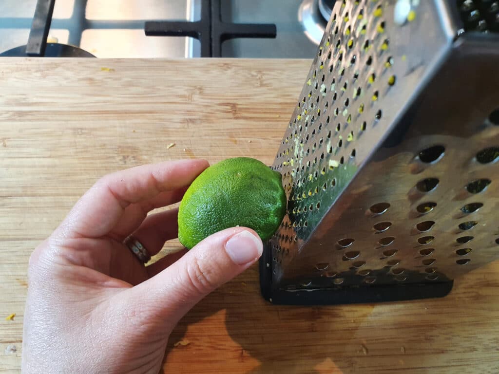 zesting lemon with the fine side of a box grater.