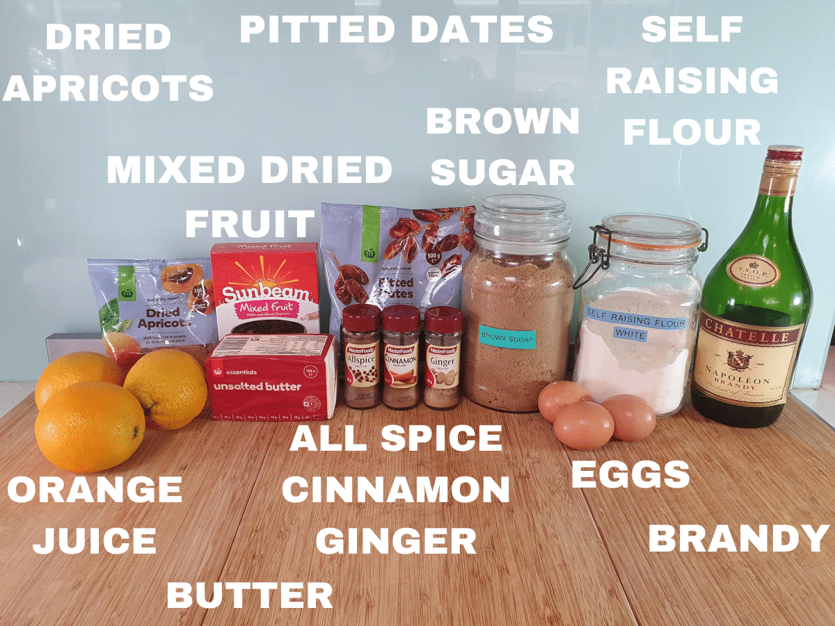 Christmas cake ingredients, dried apricots, mixed dried fruit, pitted dates, brown sugar, self raising flour, orange juice, butter, ground all spice, ground cinnamon, ground ginger, eggs, brandy.