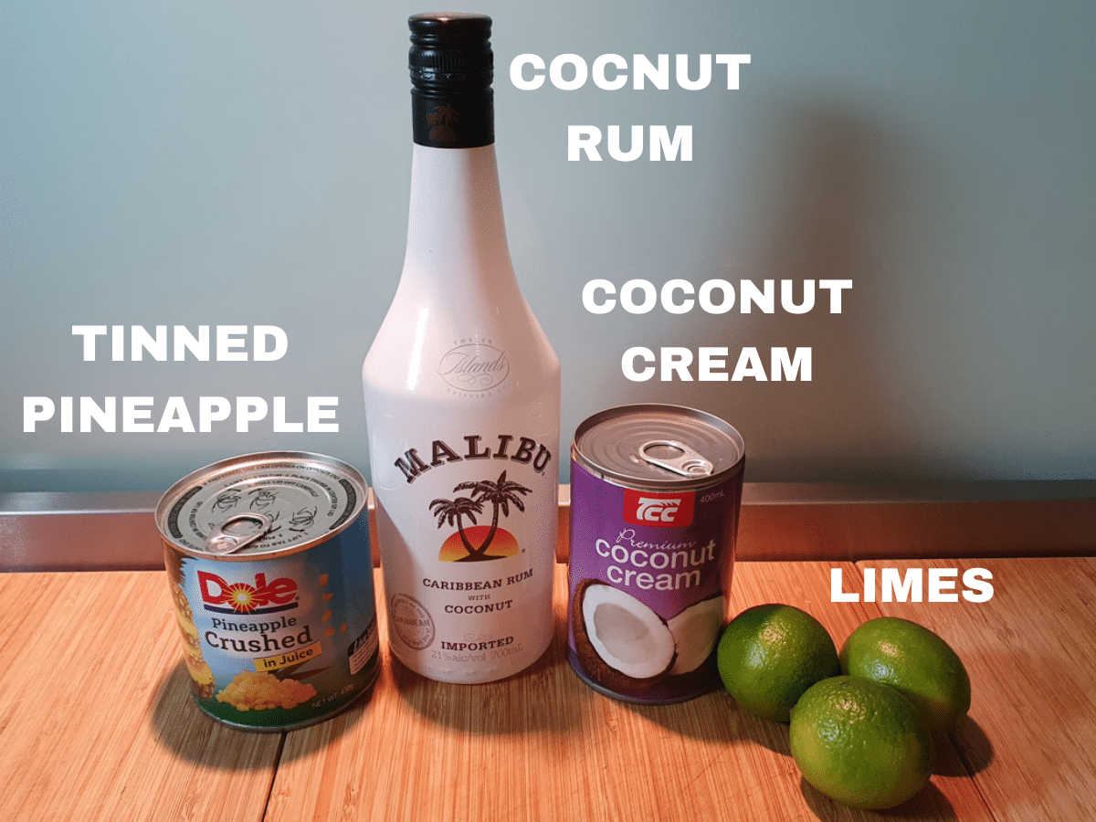 pina colada popsicle ingredients, tinned pineapple, coconut rum, coconut cream and limes.