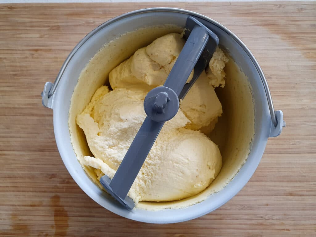 Top down view of churned ice cream in churning bowl.