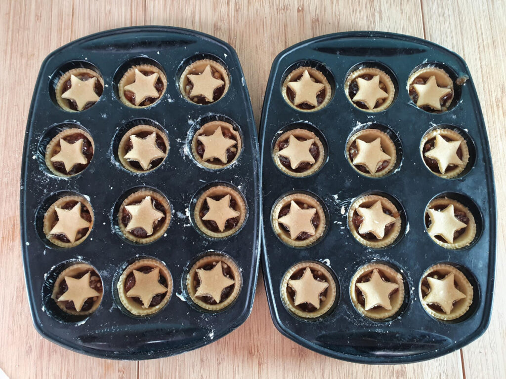 Tarts in mini muffin molds ready to bake.