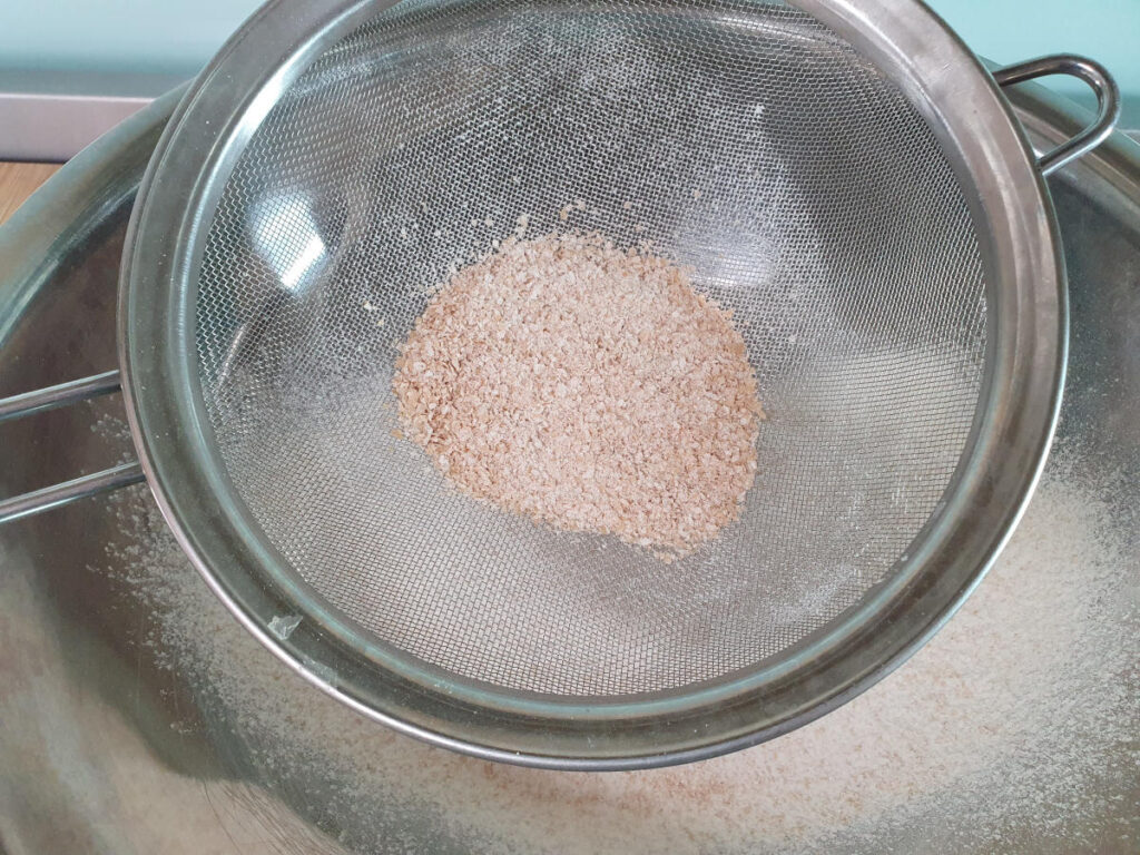 Mincemeat tarts 8 adding sifted out wholegrains.