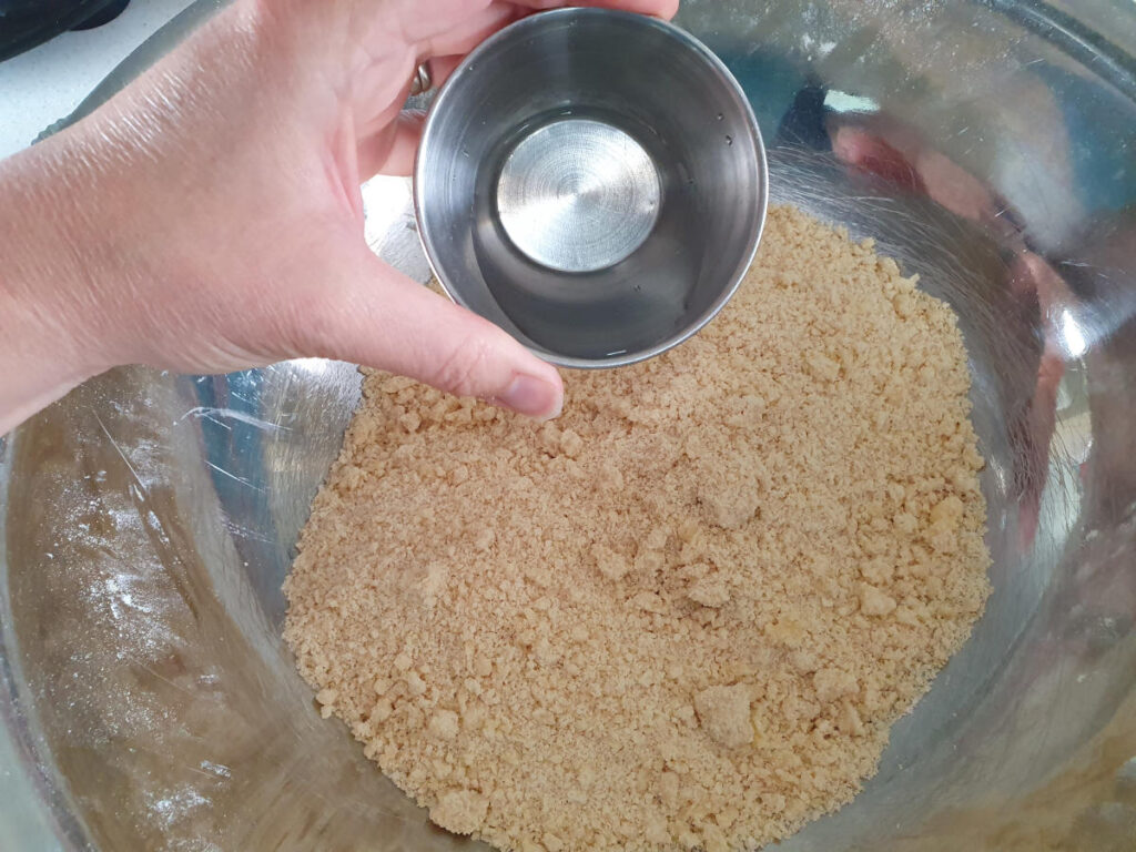 Mincemeat tarts 11 adding water to dough.