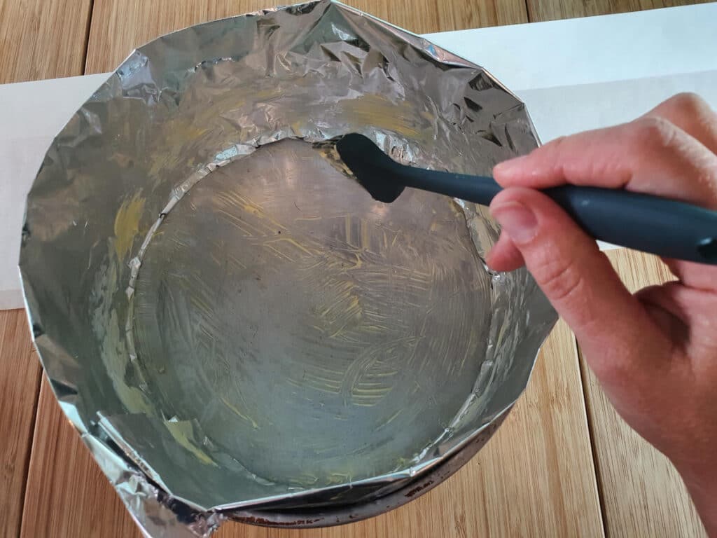 lightly greasing foil