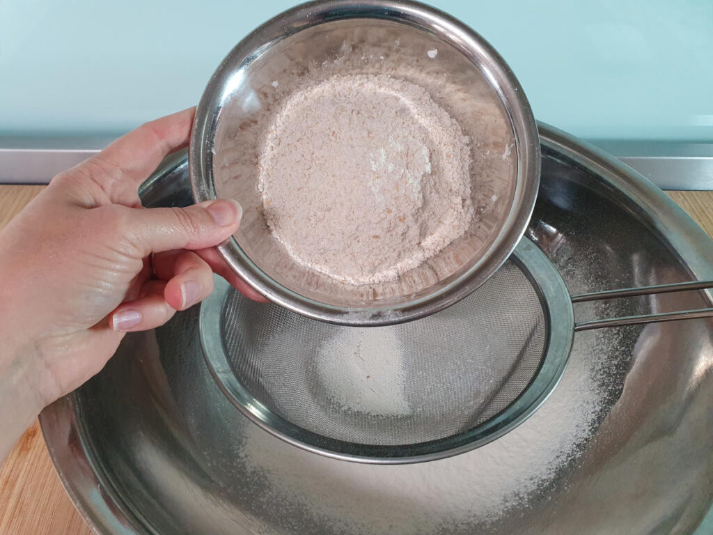 sifting in wholemeal flour.