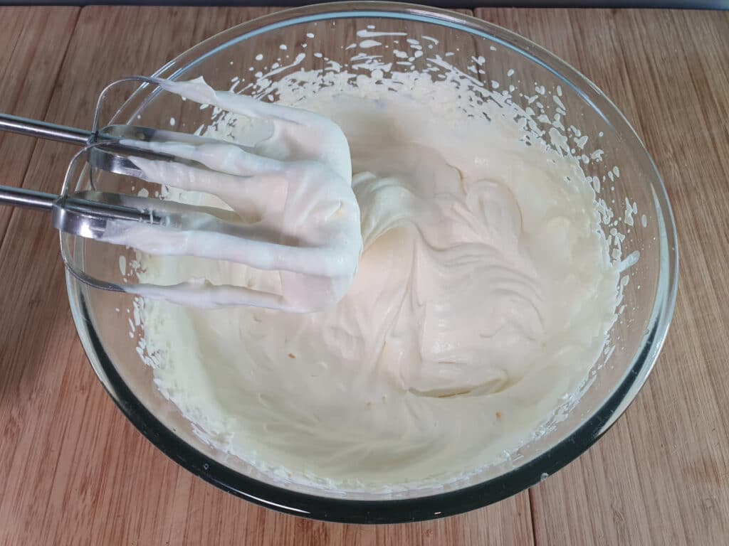 Eton mess 14 cream whipped into soft peaks.