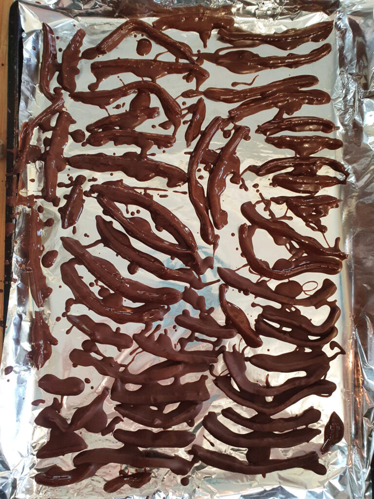 tray of of peel drying after chocolate dipping