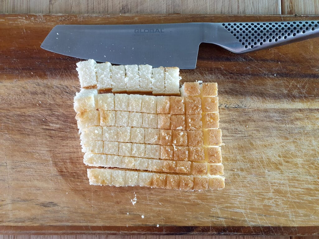 Chopping sponge cake.