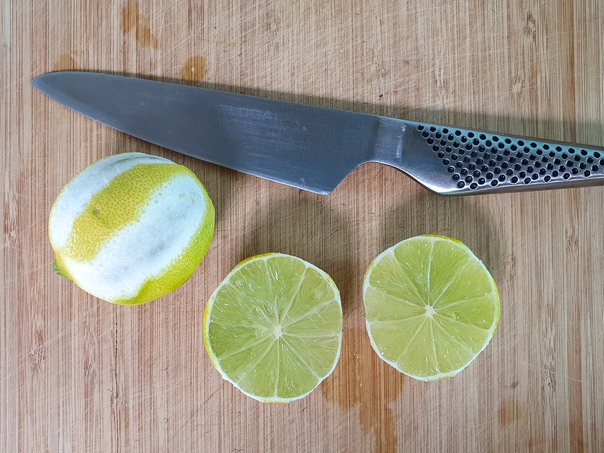 Lime popsicles 8 Slicing limes to juice.