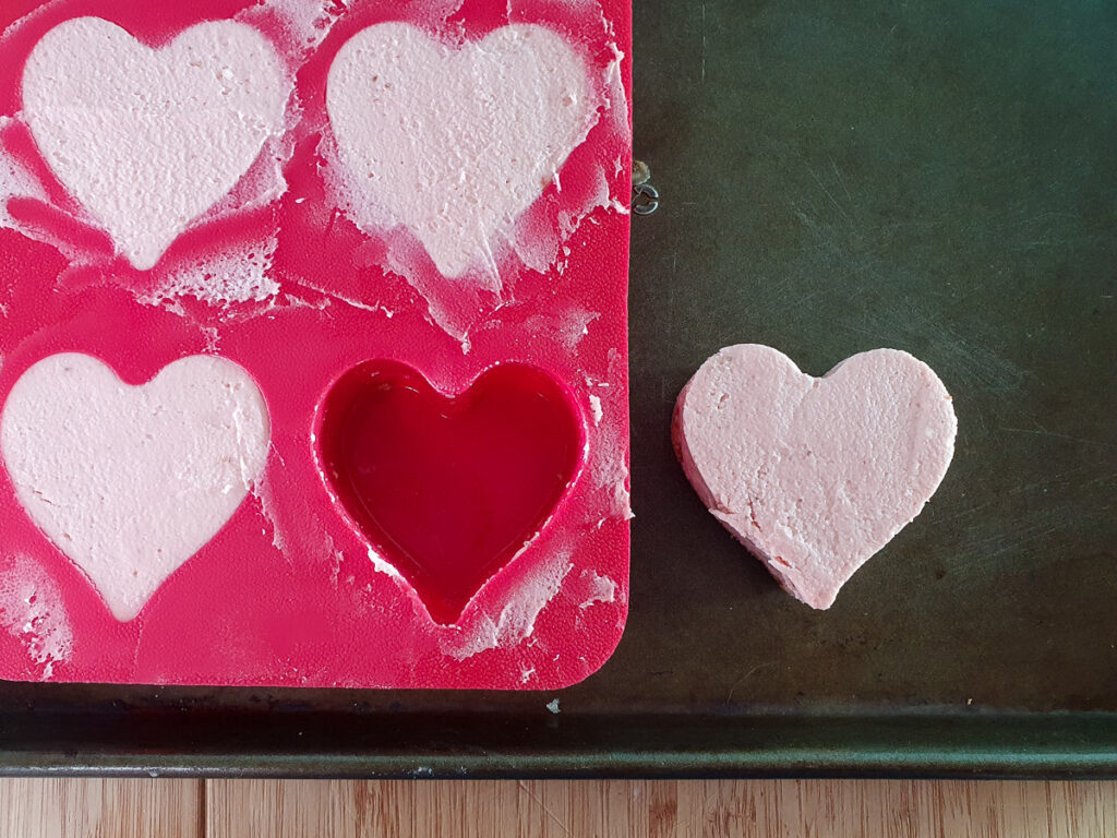Mini strawberry cheesecake 21 Cheesecake removed from heart shaped mold.