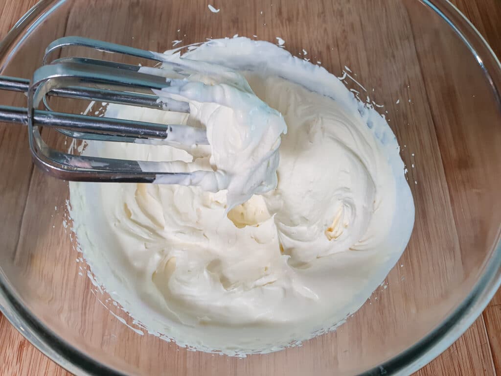 Whipping cream to soft peaks.