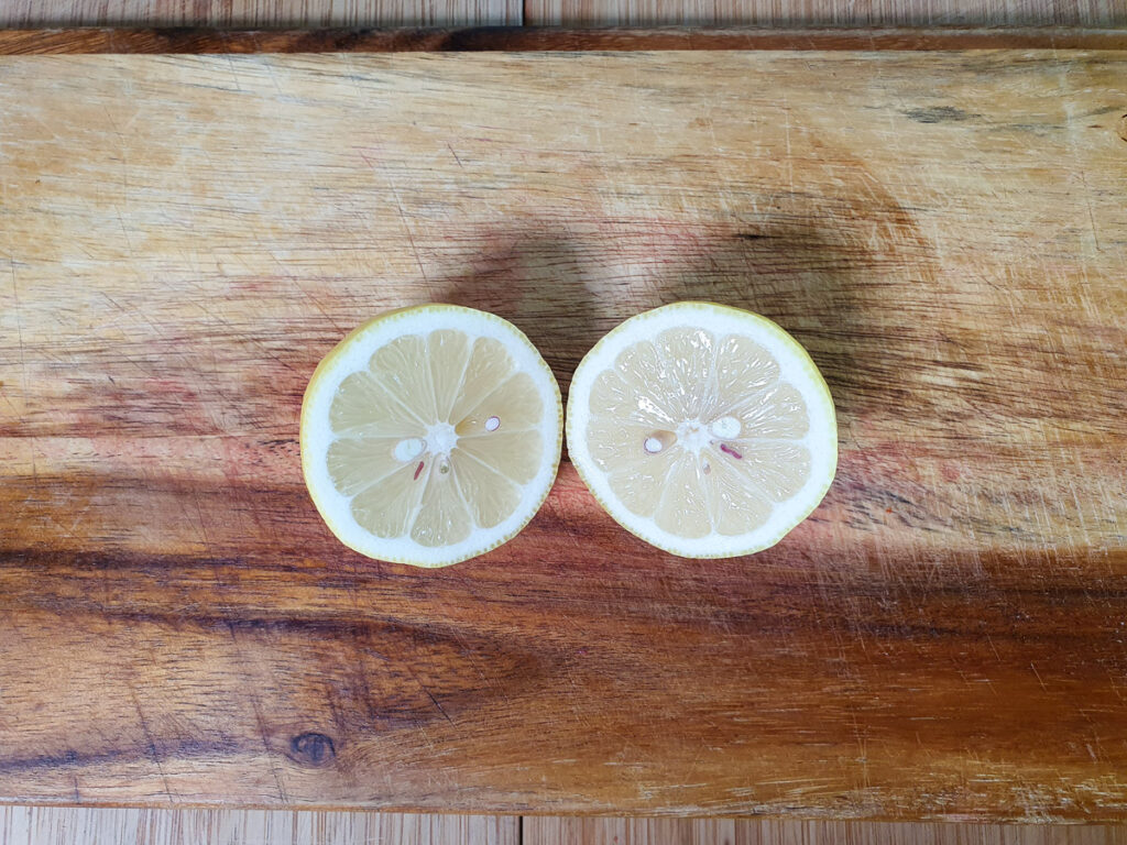 Slicing open lemon to juice.