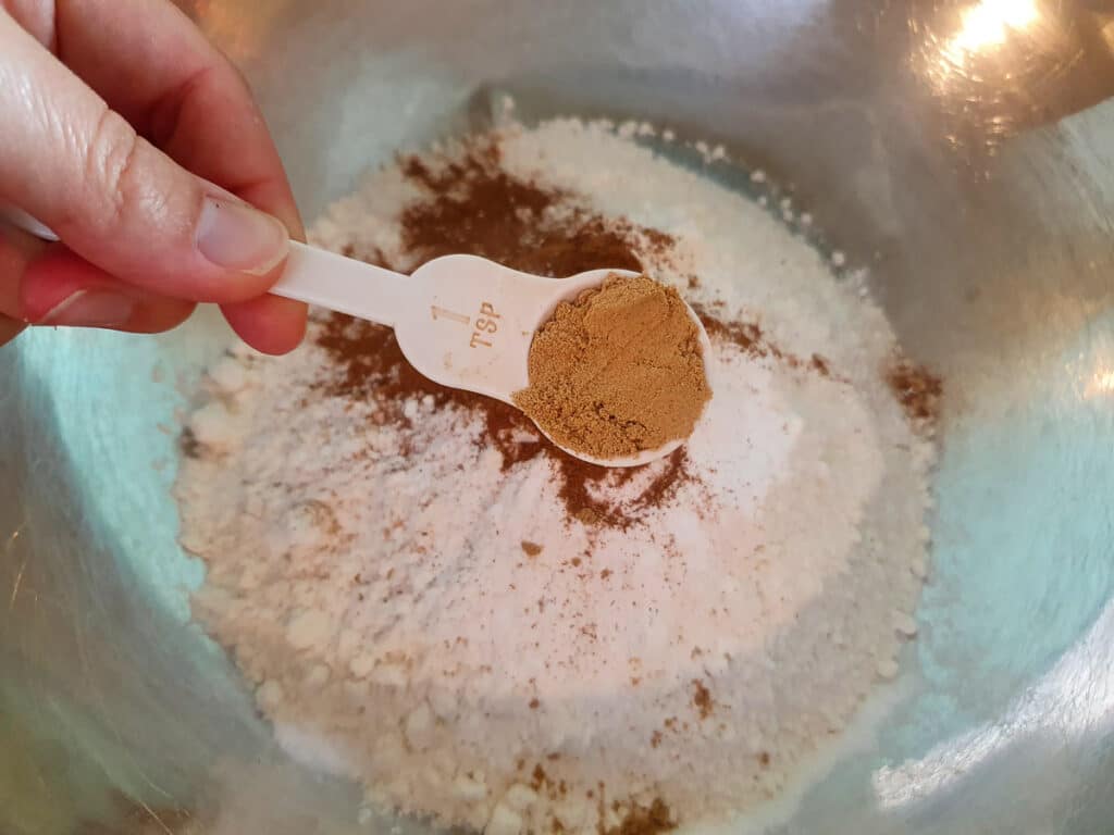 Adding ginger to flour.