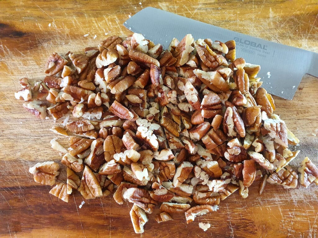 Roughly chopping pecans.