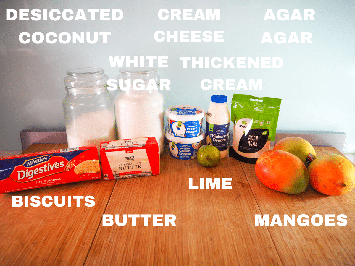 No bake mango cheesecake ingredients, desiccated coconut, digestive biscuites, white sugar, butter, cream cheese, lime, thickened cream, mangoes, agar agar powder.