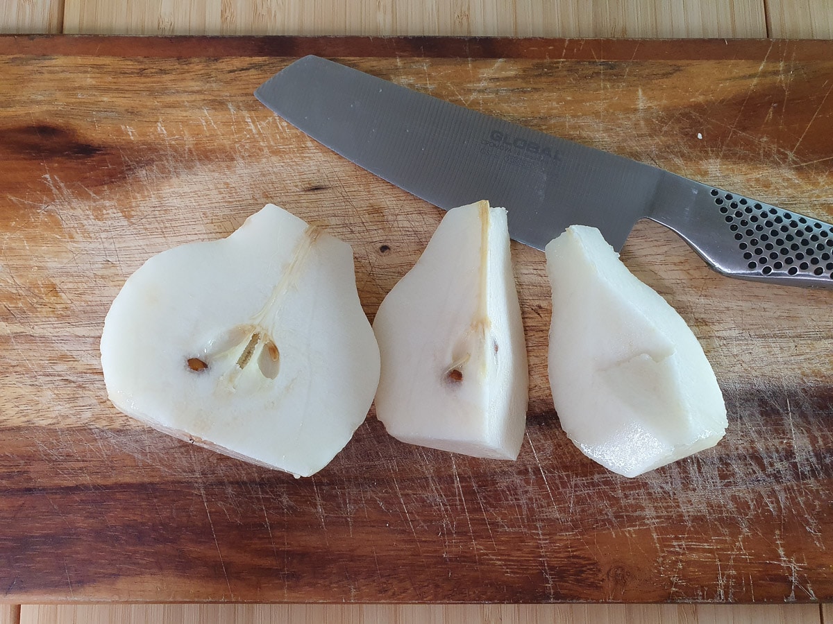 Stewed pears 5 Peeling, coring and slicing pears.