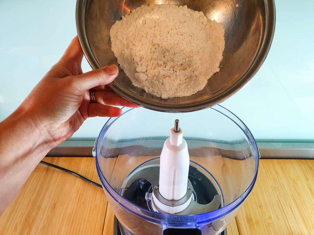 Adding plain flour to food processor.
