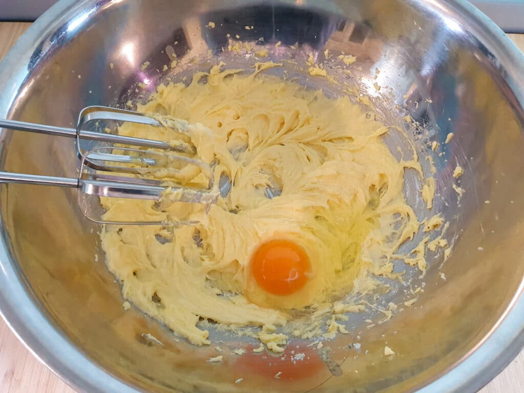 Feijoa cake 8 Beating in eggs one at a time.